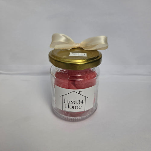 Dark Cherry Wax Melts in reusable mason jar with gold lid and cream ribbon, handmade by Luxe 34 Home