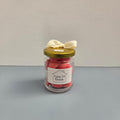 Luxe 34 Home ylang ylang wax melts in glass jar with gold lid and cream ribbon bow