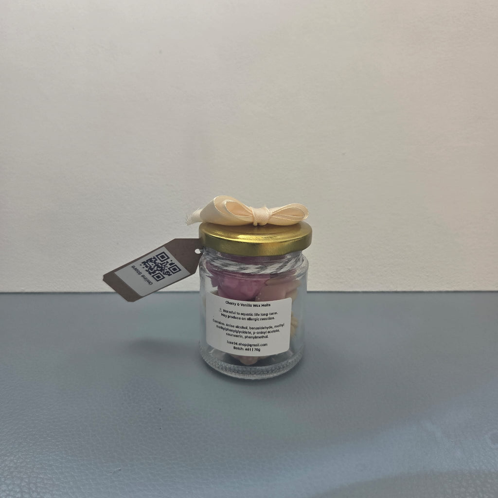 Reverse side of Cherry and Vanilla wax melts jar showing ingredients label