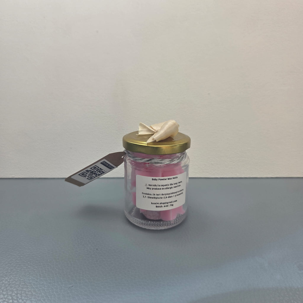 Reverse of Baby Powder wax melts jar showing ingredients label