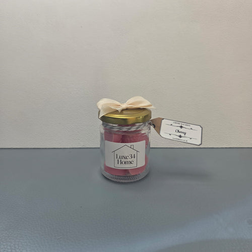 Cherry wax melts in glass jar with gold lid, cream ribbon bow and Cherry hang tag, Luxe34 Home label