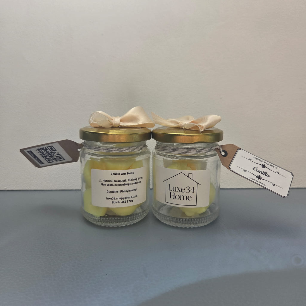 Two Vanilla wax melt jars showing front and back labels, Luxe34 Home